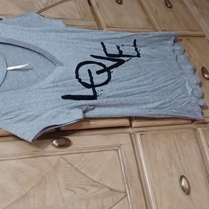 Nwot. Never worn Ladies silky love tshirt sz lg